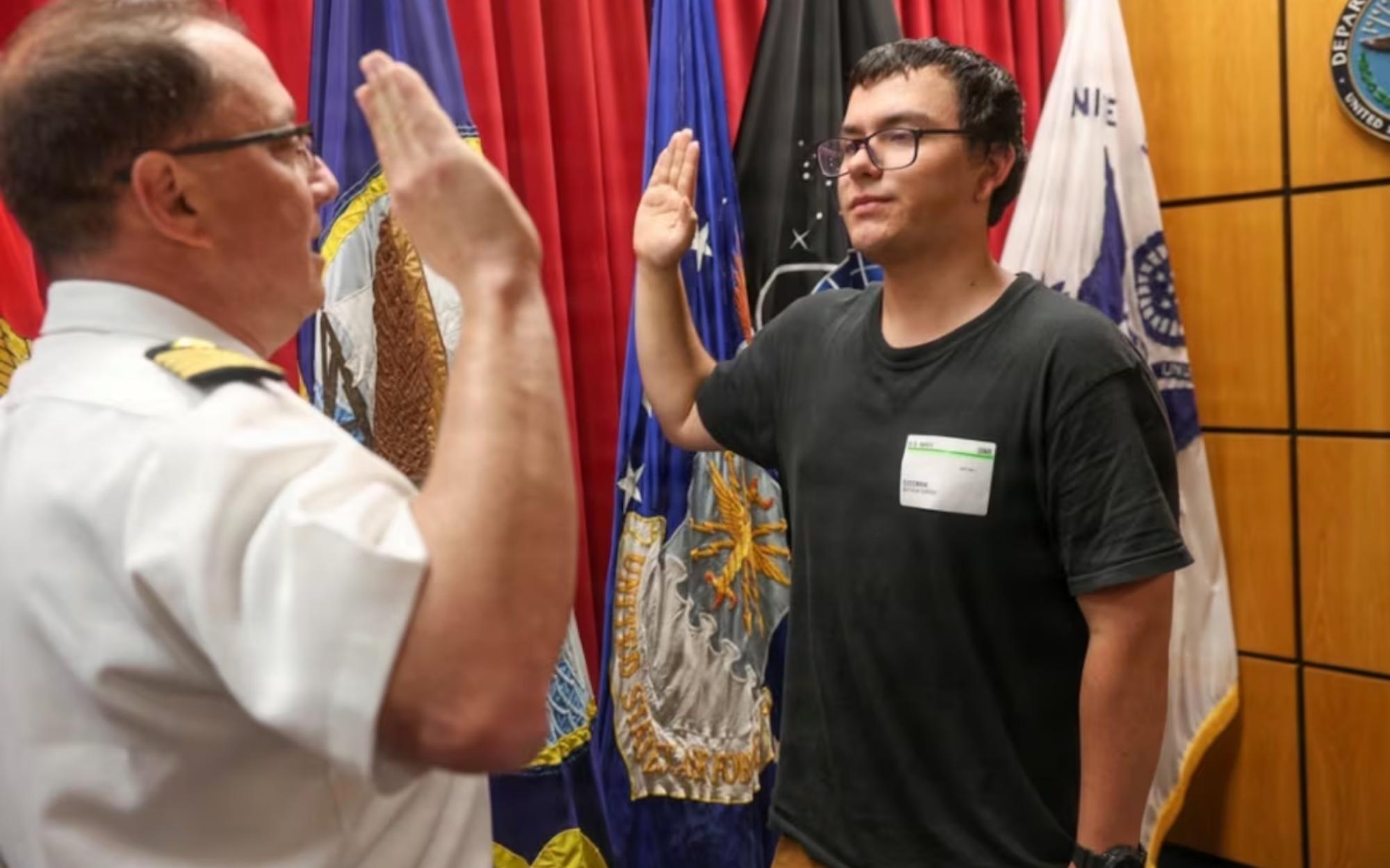 Navy Captain Closes 35 Year Career by Swearing His Son Into Service